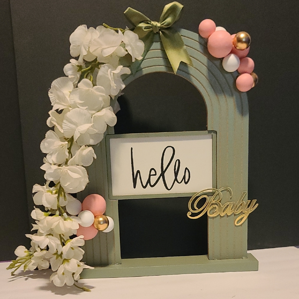 Green and Pink Decorative Accents with Floral Elements